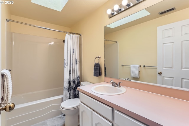 4939 Hampton Ct, Lake Oswego, OR 97035 - full bathroom featuring a skylight, toilet, shower / bathtub combination with curtain, and vanity