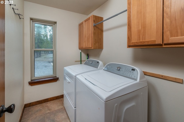 145343 Birchwood Dr, La Pine, OR 97739 - washroom featuring separate washer and dryer, cabinet space, and baseboards