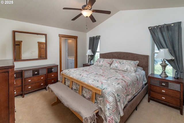 145343 Birchwood Dr, La Pine, OR 97739 - bedroom with light carpet, lofted ceiling, ensuite bathroom, and a ceiling fan