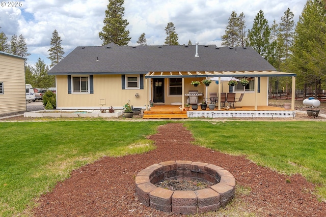 145343 Birchwood Dr, La Pine, OR 97739 - back of house with a fire pit and a shingled roof