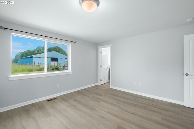 5615 Macleay Rd, Salem, OR 97317 - unfurnished room featuring wood finished floors and baseboards