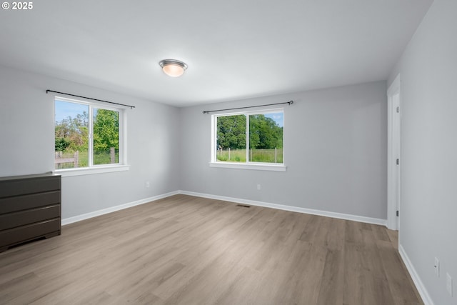 5615 Macleay Rd, Salem, OR 97317 - spare room featuring wood finished floors and baseboards
