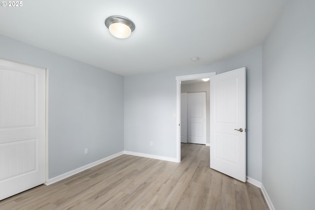 5615 Macleay Rd, Salem, OR 97317 - unfurnished room with light wood-type flooring, baseboards, and a smoke detector