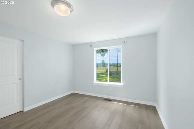 5615 Macleay Rd, Salem, OR 97317 - spare room featuring wood finished floors and baseboards