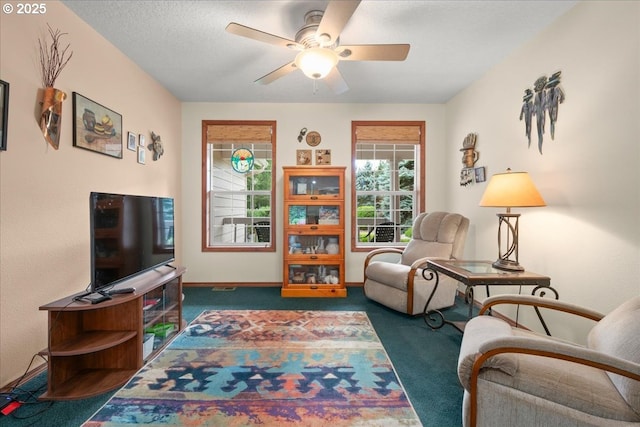 110 Dolph Dr, Ariel, WA 98603 - carpeted living room featuring a ceiling fan and baseboards
