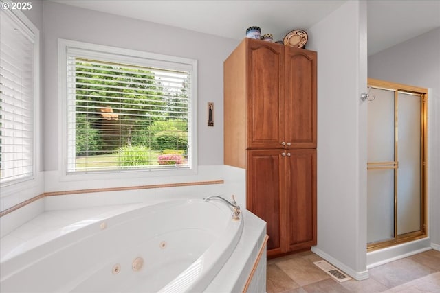 110 Dolph Dr, Ariel, WA 98603 - bathroom with a shower stall, a jetted tub, and healthy amount of natural light