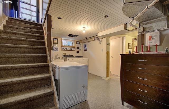 laundry area featuring separate washer and dryer and wood ceiling