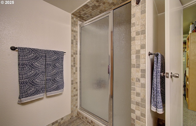 bathroom with an enclosed shower