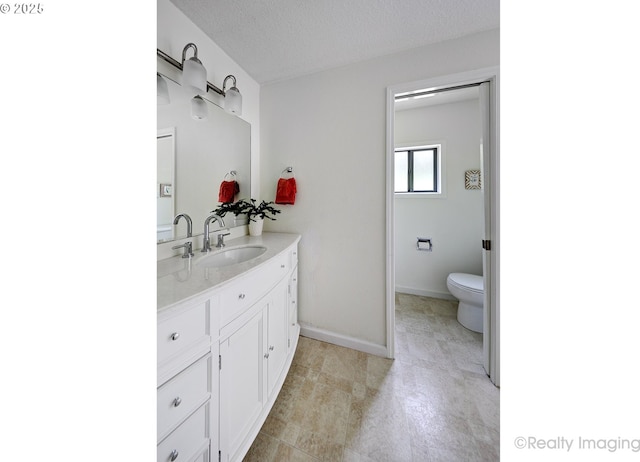 12420 Orchard Hill Rd, Lake Oswego, OR 97035 - bathroom featuring vanity, baseboards, and toilet