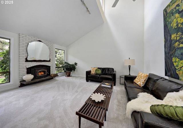12420 Orchard Hill Rd, Lake Oswego, OR 97035 - living room with a ceiling fan, rail lighting, baseboards, high vaulted ceiling, and carpet