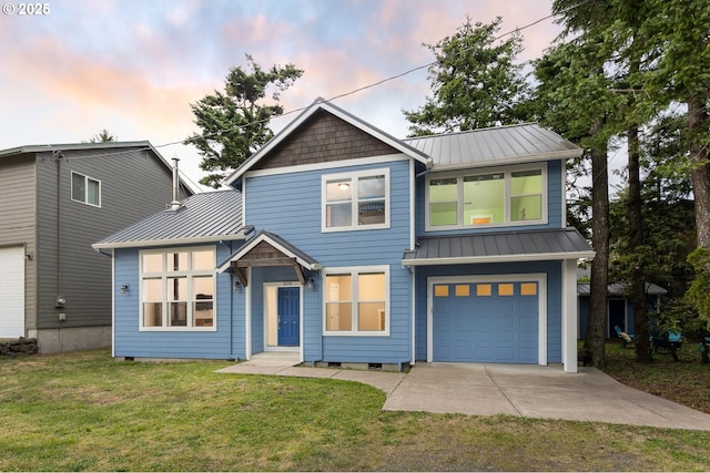 6550 Tent St, Pacific City, OR 97135 - view of front facade featuring a standing seam roof, an attached garage, metal roof, and a front lawn