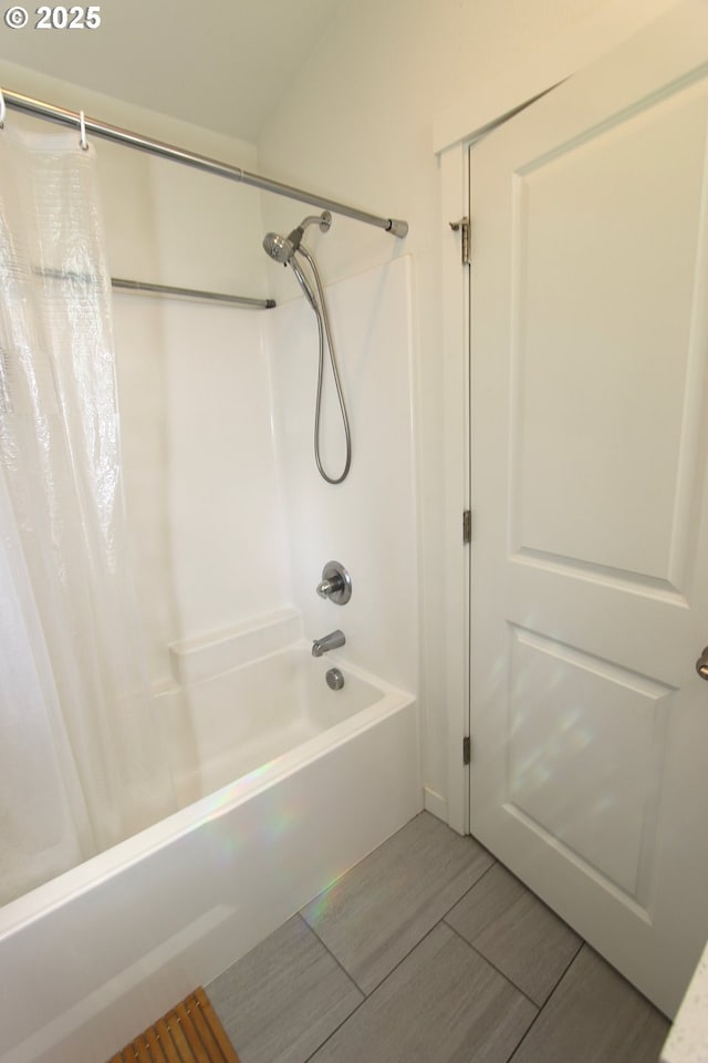611 SE 142nd Ave Unit B, Portland, OR 97233 - full bathroom with shower / tub combo with curtain and wood finished floors