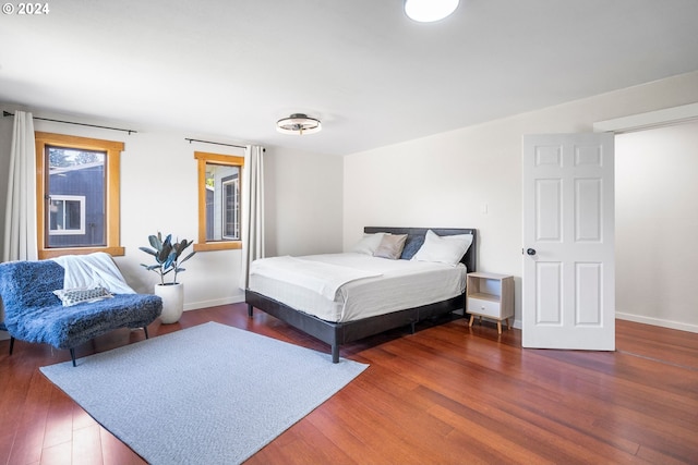 108 SE 133rd Ave, Portland, OR 97233 - bedroom featuring baseboards and wood finished floors