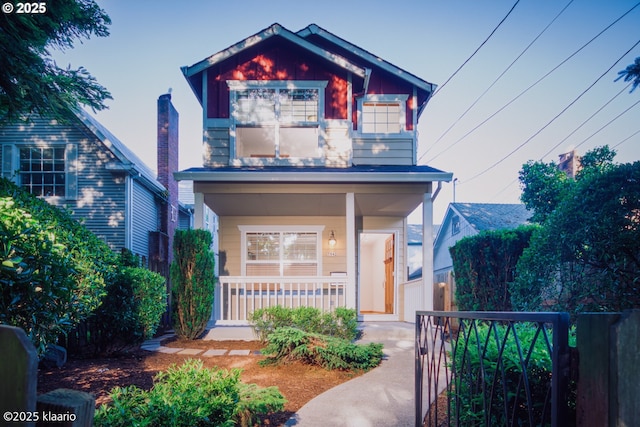 7942 N Hurst Ave, Portland, OR 97203 - view of front of house with covered porch and a balcony