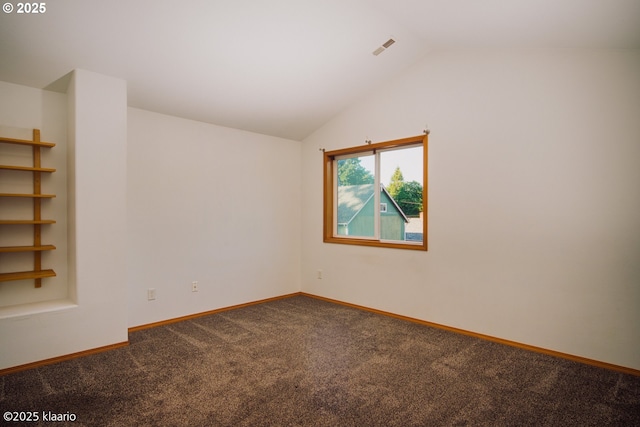 7942 N Hurst Ave, Portland, OR 97203 - carpeted spare room with baseboards and vaulted ceiling