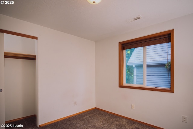 7942 N Hurst Ave, Portland, OR 97203 - unfurnished bedroom with carpet, baseboards, and a closet