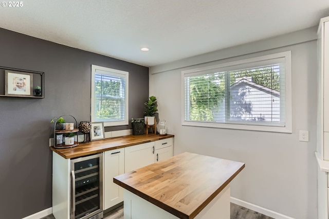 1736 Regency St, West Linn, OR 97068 - office space with beverage cooler, light wood finished floors, and recessed lighting