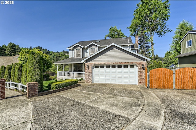 1736 Regency St, West Linn, OR 97068 - traditional-style house with brick siding, driveway, a porch, a garage, and a gate