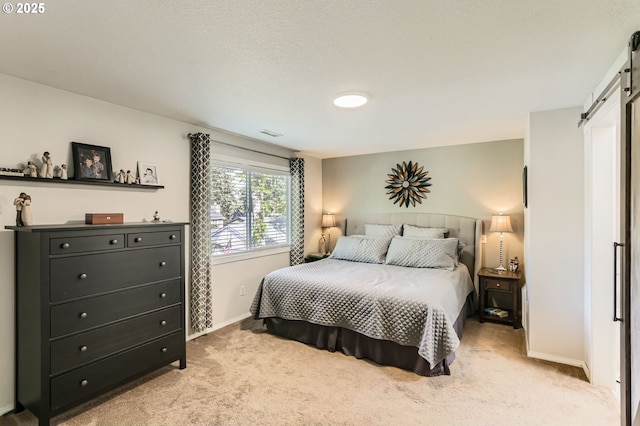 1736 Regency St, West Linn, OR 97068 - bedroom with a barn door and light carpet