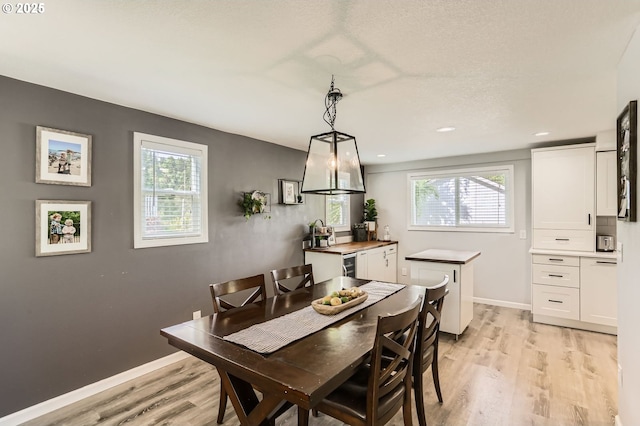 1736 Regency St, West Linn, OR 97068 - dining space featuring light wood-type flooring, healthy amount of natural light, and recessed lighting