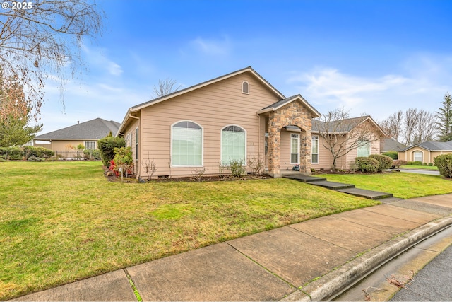 view of front of property with a front lawn