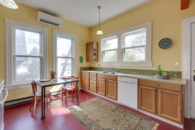 2122 NW Everett St, Portland, OR 97210 - kitchen with dishwasher, a wall unit AC, healthy amount of natural light, and a sink