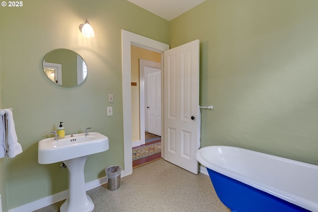 2122 NW Everett St, Portland, OR 97210 - full bath featuring a soaking tub and baseboards