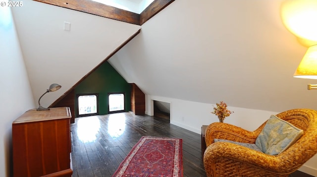 2122 NW Everett St, Portland, OR 97210 - living area featuring hardwood / wood-style floors, lofted ceiling, and baseboards
