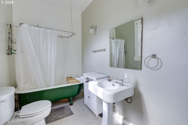 2122 NW Everett St, Portland, OR 97210 - bathroom with toilet and shower / bath combo with shower curtain