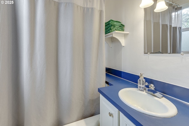 2122 NW Everett St, Portland, OR 97210 - bathroom with vanity and a shower with shower curtain