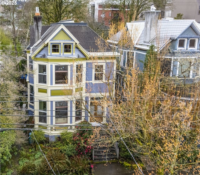 2122 NW Everett St, Portland, OR 97210 - rear view of property featuring a chimney and a shingled roof