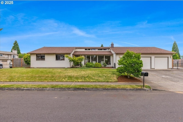 1725 SE Cochran Dr, Gresham, OR 97080 - view of front facade with a garage, driveway, and a chimney