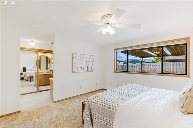 1725 SE Cochran Dr, Gresham, OR 97080 - bedroom with light colored carpet, a ceiling fan, and ensuite bathroom