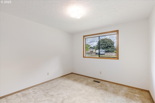 1725 SE Cochran Dr, Gresham, OR 97080 - unfurnished room featuring light colored carpet and a textured ceiling
