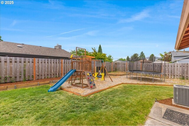 1725 SE Cochran Dr, Gresham, OR 97080 - view of jungle gym featuring a trampoline and a fenced backyard