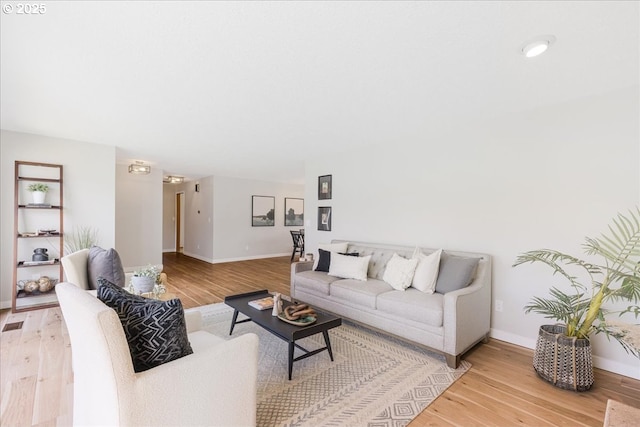 1725 SE Cochran Dr, Gresham, OR 97080 - living room featuring light wood-style floors and baseboards