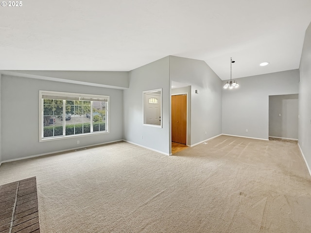573 SE 73rd Ave, Hillsboro, OR 97123 - carpeted spare room with vaulted ceiling and a chandelier
