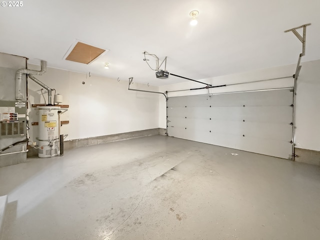 573 SE 73rd Ave, Hillsboro, OR 97123 - garage featuring a garage door opener and strapped water heater