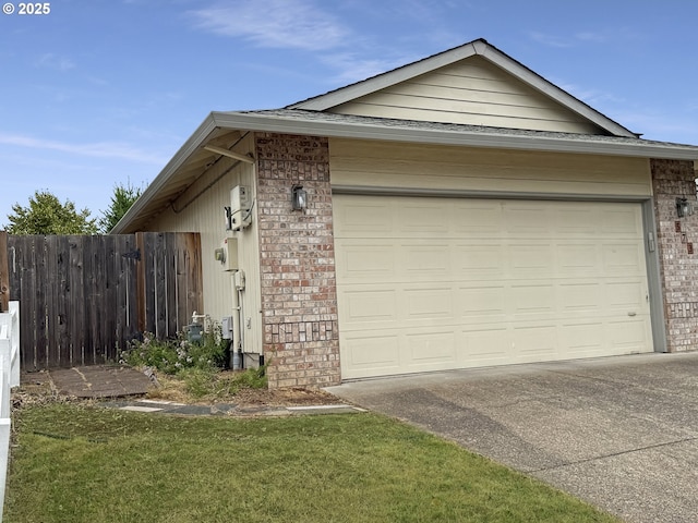 573 SE 73rd Ave, Hillsboro, OR 97123 - view of side of property featuring brick siding and concrete driveway