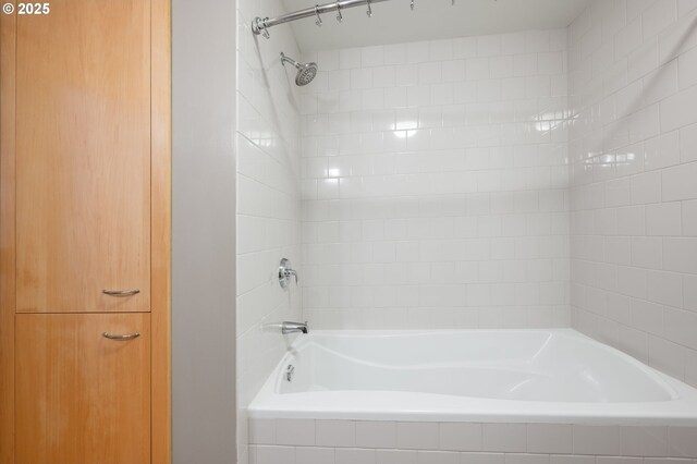 1221 SW 10th Ave Unit 311, Portland, OR 97205 - bathroom with tiled shower / bath combo