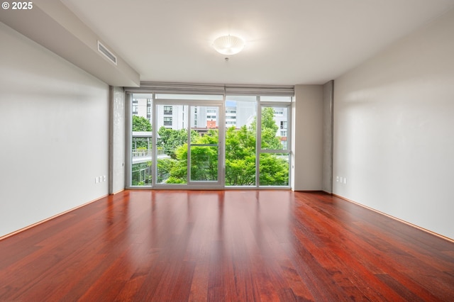 1221 SW 10th Ave Unit 311, Portland, OR 97205 - empty room with wood finished floors