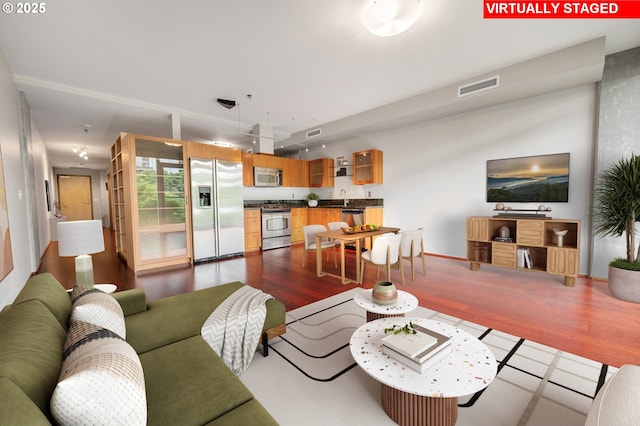 1221 SW 10th Ave Unit 311, Portland, OR 97205 - living area with wood finished floors