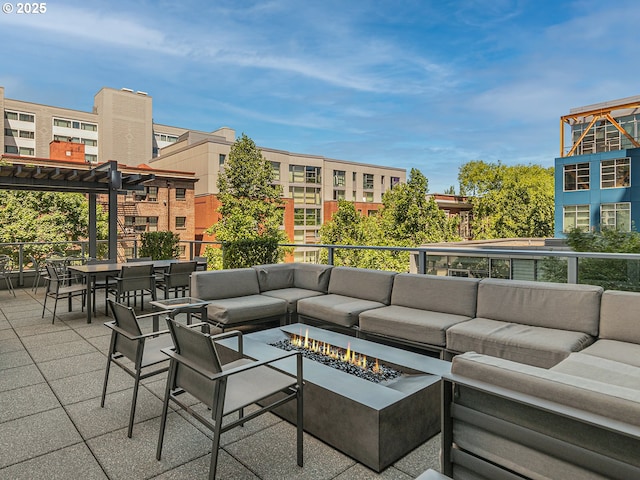 1221 SW 10th Ave Unit 311, Portland, OR 97205 - view of patio / terrace featuring an outdoor living space with a fire pit and outdoor dining area