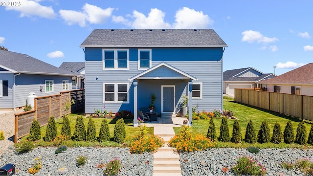 764 Seacrest Dr, Bandon, OR 97411 - back of property with a patio and roof with shingles