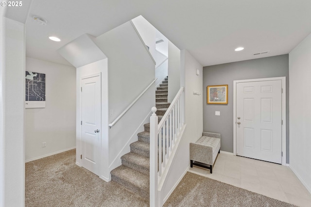 764 Seacrest Dr, Bandon, OR 97411 - carpeted entrance foyer featuring stairs, baseboards, and recessed lighting
