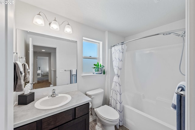 764 Seacrest Dr, Bandon, OR 97411 - full bathroom with vanity, shower / tub combo, toilet, and a textured ceiling