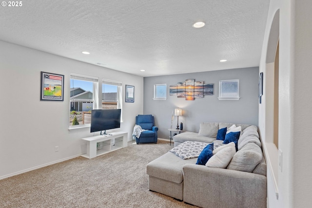 764 Seacrest Dr, Bandon, OR 97411 - living area featuring a textured ceiling, carpet flooring, recessed lighting, and baseboards