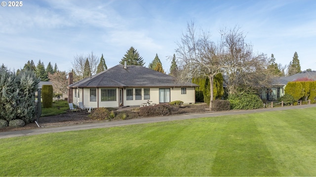 view of front of property with a front lawn