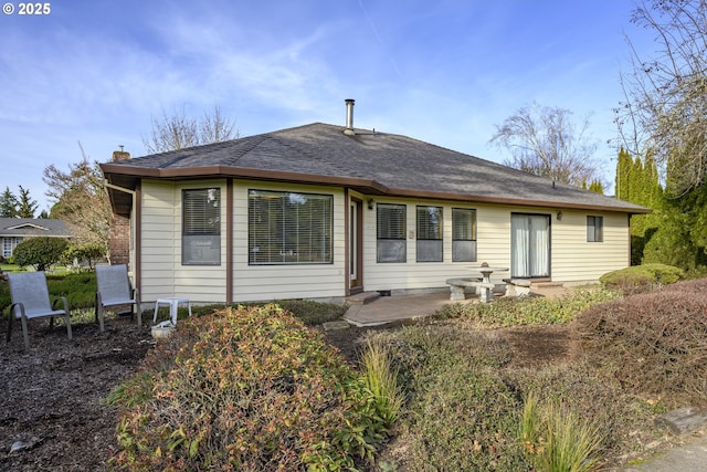 rear view of house with a patio