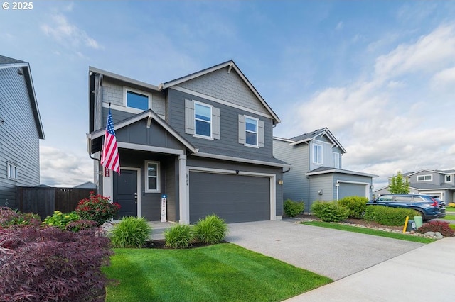 8720 N 3rd Way, Ridgefield, WA 98642 - craftsman-style house with an attached garage, concrete driveway, and board and batten siding